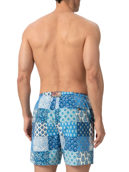 Mid-length swim-shorts Caprese with floral patch print
