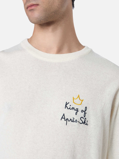 Man white sweater Heron with King of apres ski embroidery